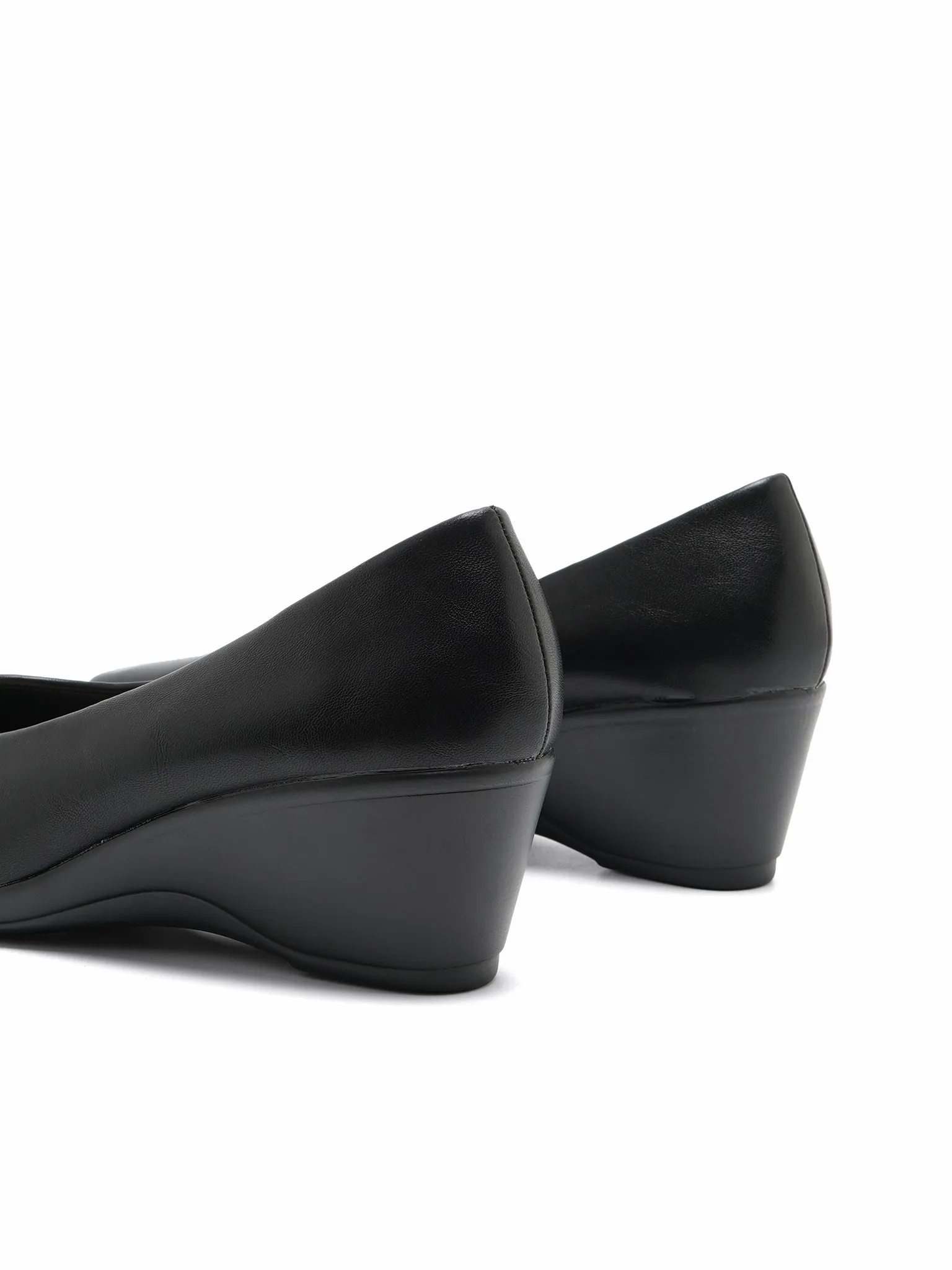 Beckett Wedge Pumps